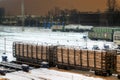 Cargo train carrying wood at night Royalty Free Stock Photo