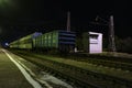 Cargo train and control tower in Pavelets railway station of Ryazan region, Russia. Royalty Free Stock Photo