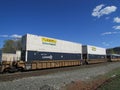 Cargo train of inter modal containers of JB Hunt and Umax in West Haverstraw, NY. Royalty Free Stock Photo