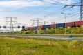 Cargo train carrying containers in a port area Royalty Free Stock Photo