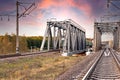 Cargo train on a metal bridge in motion Royalty Free Stock Photo