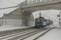 Cargo train near railway stop with snowy bridge 12 16 2022 Veseli nad Luznici CZ