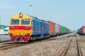 Cargo train platform with freight train container at depot Royalty Free Stock Photo