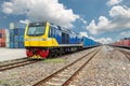 Cargo train platform with freight train container at depot in po Royalty Free Stock Photo