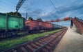 Cargo train platform at sunset. Railroad in Ukraine. Railway Royalty Free Stock Photo