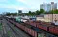 Cargo train in sorting freight railway station, rail freight transport