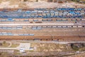 Cargo trains. Aerial view of colorful freight trains on the railway station. Wagons with goods on railroad.Aerial view Royalty Free Stock Photo