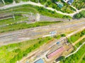 Cargo trains close-up. Aerial view of colorful freight trains on the railway station. Wagons with goods on railroad. Heavy Royalty Free Stock Photo