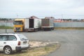 Cargo transportation lorries vans in motor transport depot on cl