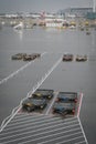 Cargo transportation vehicles parked on london Heathrow airport terminal.