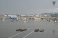 Cargo transportation vehicles parked on london Heathrow airport terminal. Royalty Free Stock Photo
