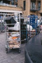 Cargo trolleys filled with recycling rubbish next to the Sainsbury`s shop Royalty Free Stock Photo