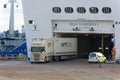 Cargo Truck Exits Ferry at Sea Port