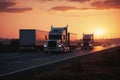 Cargo Trucks on the Highway at Sunset carrying merchendise. Royalty Free Stock Photo