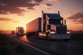 Cargo Trucks on the Highway at Sunset carrying merchendise. Beautiful Truck Royalty Free Stock Photo