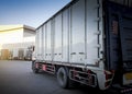 Cargo Trucks Parking lot with at The Warehouse. Shipping Cargo Container. Industry Freight Truck Logistics Cargo Transport.