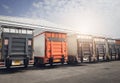 Cargo Trucks Parking lot at The Warehouse. Slider Lift for Loading Truck. Shipping Cargo Container. Lorry Loading. Delivery Trucks Royalty Free Stock Photo