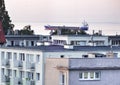 Cargo vessel entrance to the port. Artistic look in vintage vivid colours. Royalty Free Stock Photo