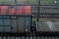 Cargo wagon, railway carriage, rail freight cars on rails Royalty Free Stock Photo