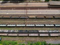 Cargo wagons on train station in city, aerial view Royalty Free Stock Photo