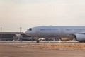 Cargo white aircraft without airline`s livery and logo on the runway