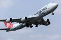 Cargolux jumbo Boeing B747 flying up in the sky