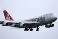 Cargolux jumbo Boeing B747 flying up in the sky