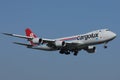 Cargolux jumbo Boeing B747 flying up in the sky