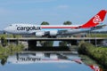 Cargolux jumbo Boeing B747 taxiing on the bridge