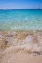 Caribbean beach with a lot of palms and white sand, Dominican Republic. Sunny warm day at the sea under palm trees. Sun loungers Royalty Free Stock Photo