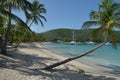Caribbean beach with sloping Palms and Boat Royalty Free Stock Photo