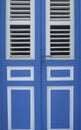 Caribbean blue and white entrance door close-up. Tropical architecture. Martinique, Antilles French West Indies Royalty Free Stock Photo