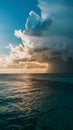 Caribbean evening sky contrasts sunlight with dark storm clouds