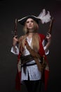 Caribbean female pirate with red coat and tricorn