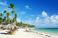 Caribbean resort beach with umbrellas and chairs Royalty Free Stock Photo