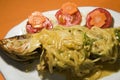 Caribbean style whole fish with salad Royalty Free Stock Photo