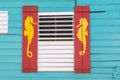 Caribbean style window with sea horse design Royalty Free Stock Photo