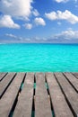 Caribbean wood pier with turquoise aqua sea