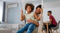 Caring african american mother hugging teenage daughter, enjoy moment of love, motherhood concept Royalty Free Stock Photo