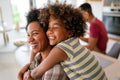 Caring african american mother hugging teenage daughter, enjoy moment of love, motherhood concept Royalty Free Stock Photo