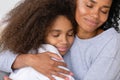 Caring african american single mother hugging teenage daughter, motherhood concept Royalty Free Stock Photo