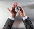 Caring businessman hands holding a safe money box, flat lay