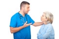 Caring doctor give explanation to senior woman