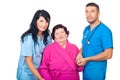 Caring doctors with elderly patient Royalty Free Stock Photo