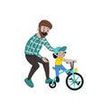 A caring father teaches his daughter to ride a bike for the first time. Father helps little boy child riding a bike