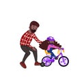 A caring father teaches his daughter to ride a bike for the first time. Father helps little girl child riding a bike