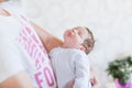 Caring hands of parents. Children`s feet in the hands of his father. father and her baby. The concept of a happy family. Beautifu Royalty Free Stock Photo