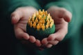 Caring Hands Protecting a Miniature Community: Symbolizing Empathy and Human Connection in a World in Need Royalty Free Stock Photo
