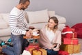 Caring handsome husband bringing his wife a breakfast Royalty Free Stock Photo