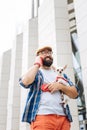 Caring husband calling his wife while walking with dog Royalty Free Stock Photo